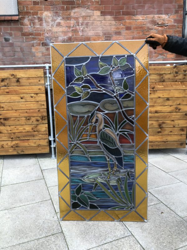Contemporary leaded glass window depicting a Heron.