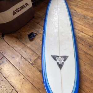O'Shea surfboard with bag.