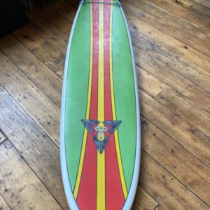 O'Shea surfboard with bag.