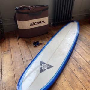 O'Shea surfboard with bag.