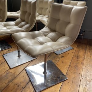 Mid century chrome and leather swivel chairs