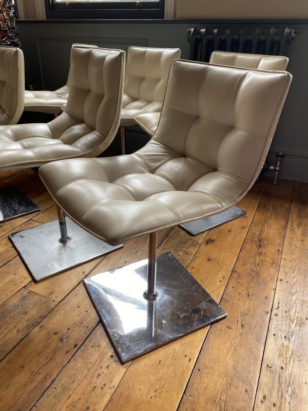 Mid century chrome and leather swivel chairs