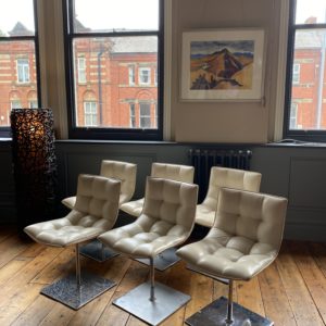 Mid century chrome and leather swivel chairs