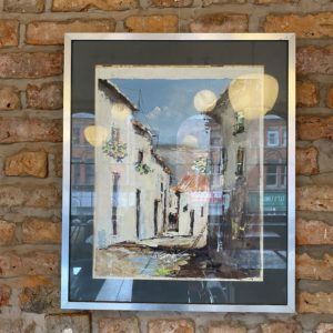 Framed and glazed print of a village street scene