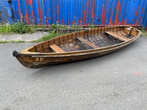 Edwardian clinker built rowing boat .