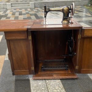 Vintage Jones’ Treadle Sewing Machine in Cabinet