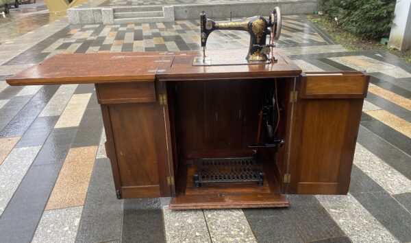 Vintage Jones' Treadle Sewing Machine in Cabinet