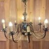 Early 20th Century Flemish Twelve Arm Tiered Chandelier Early 20th Century Flemish Twelve Arm Tiered Chandelier