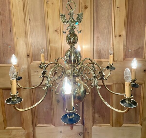 Early 20th Century Flemish Polished Brass Eight Arm Chandelier