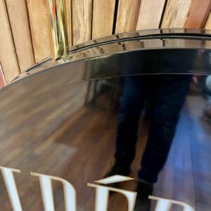 Contemporary signage mirror