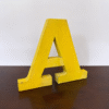 Yellow Metal Letter