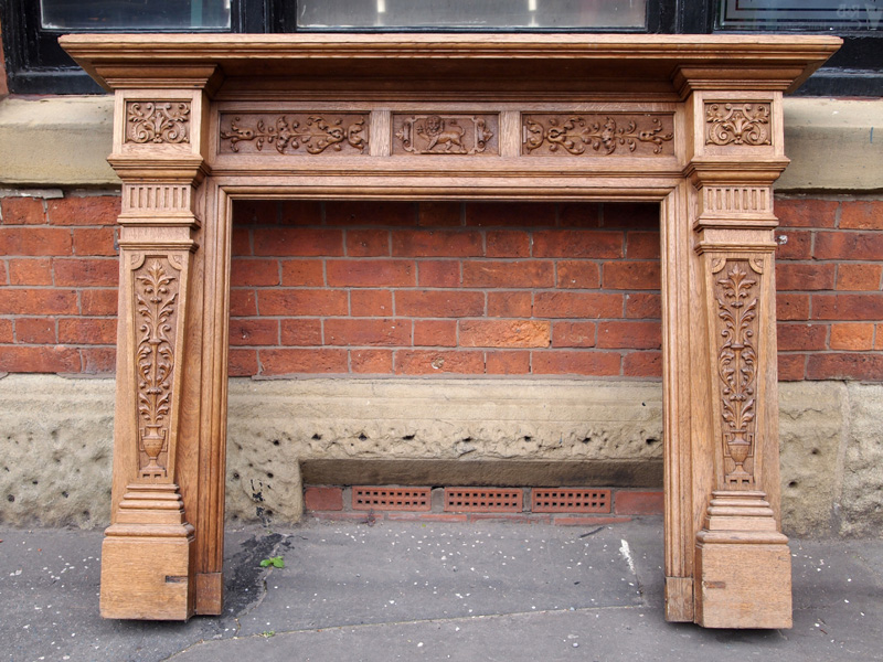 Antique Wood Surround with Carved Detailing